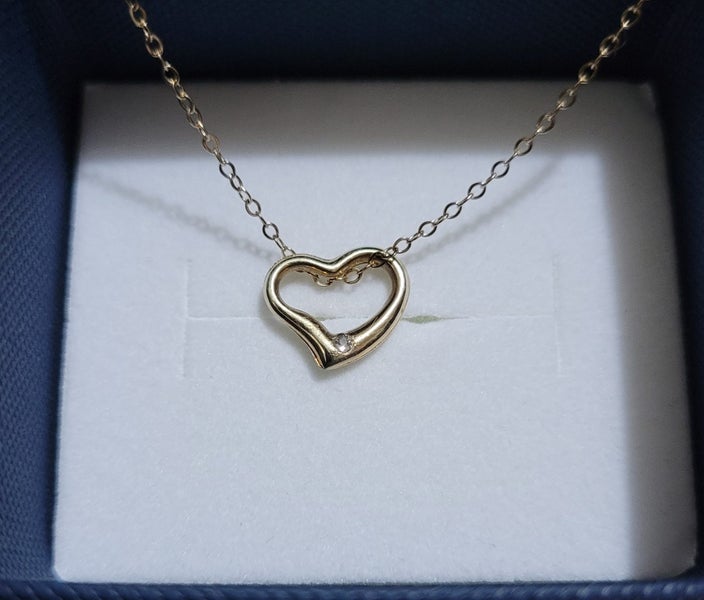 9ct Gold Heart Pendant with Diamond Carousel 2