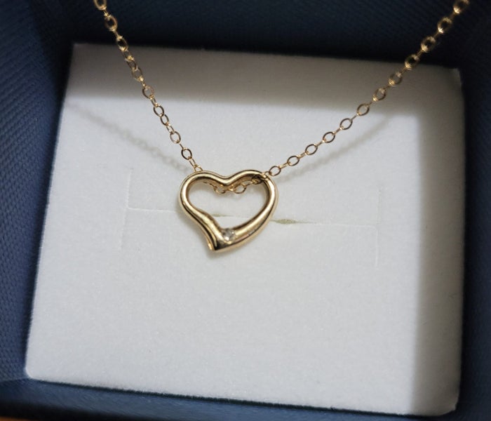 9ct Gold Heart Pendant with Diamond Carousel 1