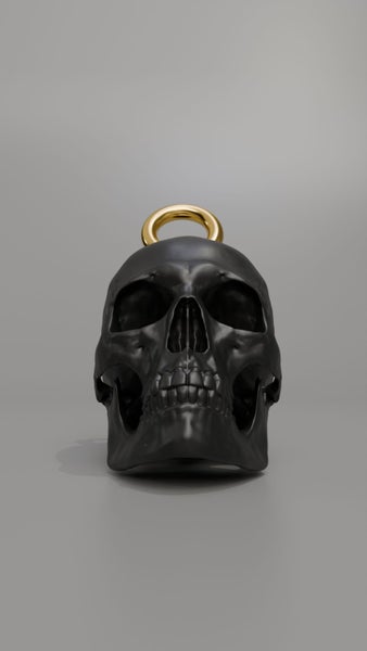 Black Skull Keychain with Gold Ring Carousel 2