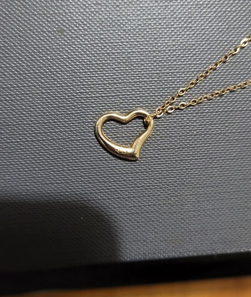 9ct Gold Heart Pendant with Diamond Carousel 4