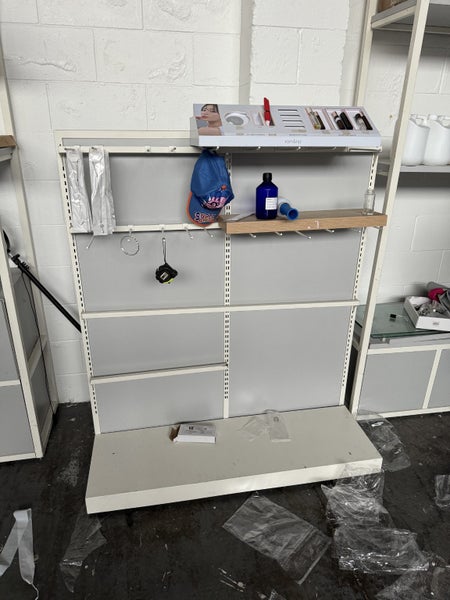 Pegboard rack display shop shelves Carousel 1
