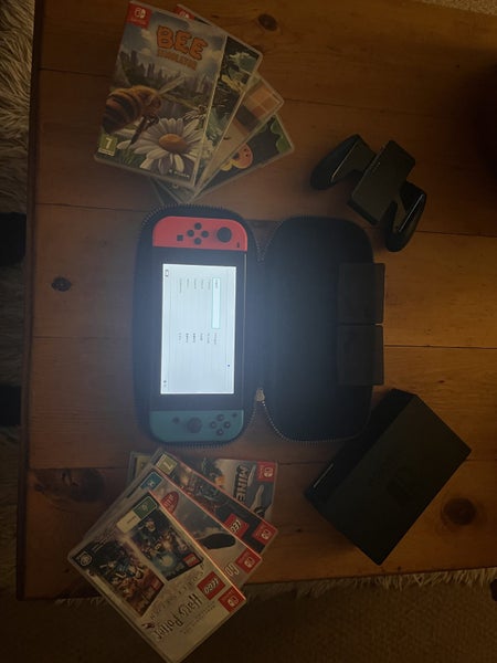 Nintendo switch & 8 games with accessories63003172129026113