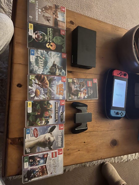 Nintendo switch & 8 games with accessories63003172129026111
