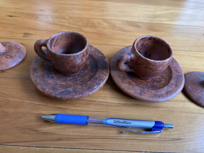 Two tiny tea cups with lids Carousel 1