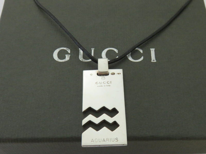 Gucci Sterling Silver Aquarius Charm Black Leather Cord Unisex Pendant Necklace Carousel 1