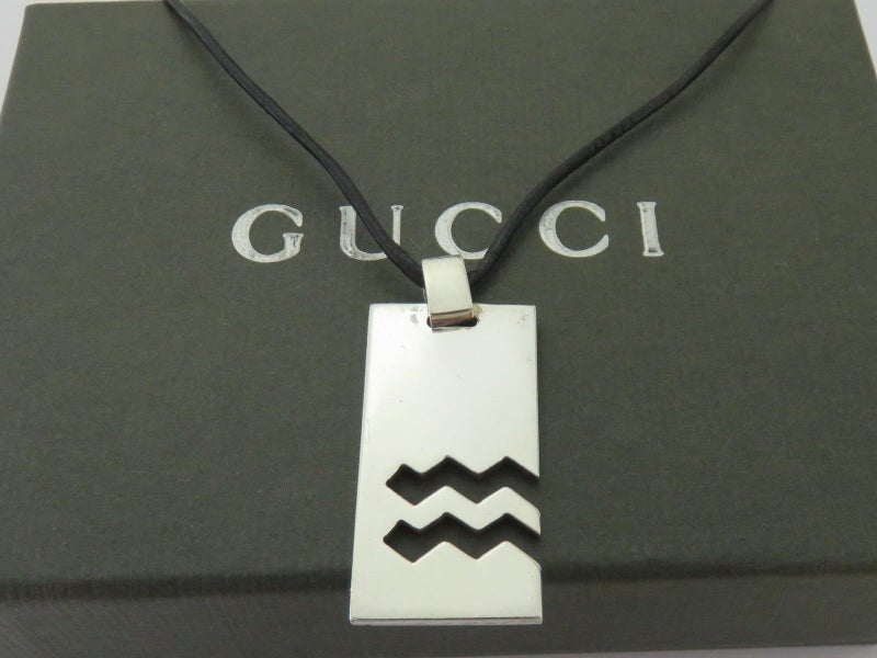 Gucci Sterling Silver Aquarius Charm Black Leather Cord Unisex Pendant Necklace Carousel 2