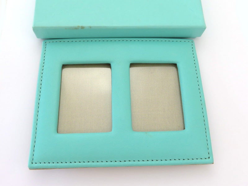 TIFFANY & CO Blue Leather Photo Frame Carousel 1