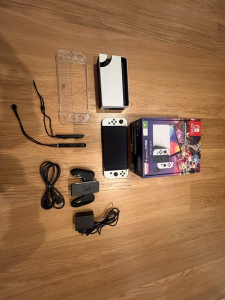 $1 RESERVE – Nintendo Switch OLED + Heaps of Games!62966411134851111