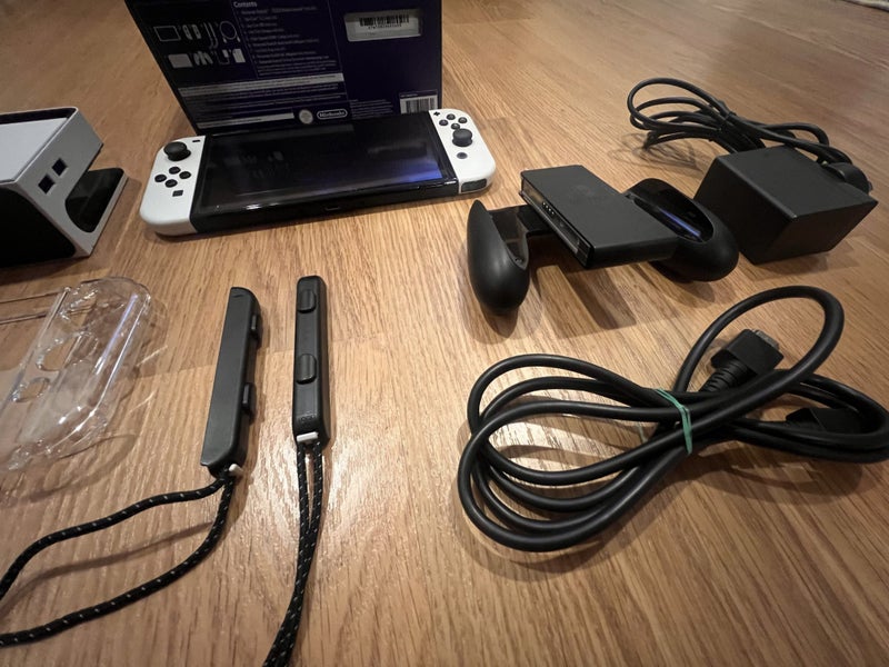 $1 RESERVE – Nintendo Switch OLED + Heaps of Games!62966411134851112