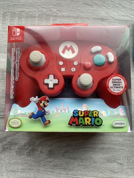 Mint condition Nintendo Switch Console bundle with Mario controller and extras Carousel 3