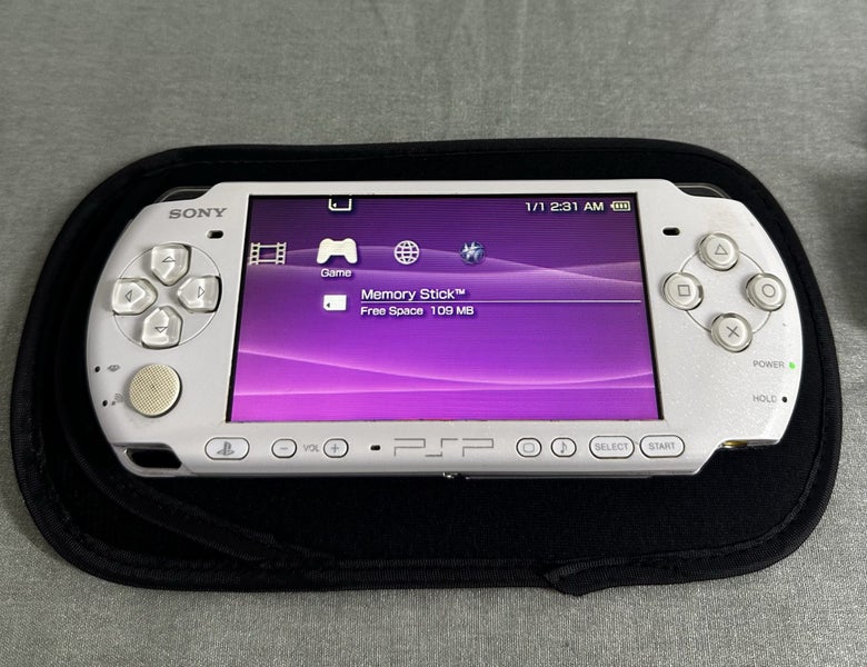 PlayStation Portable (PSP) 3000 – Pearl White | 64GB | Fully Set Up62986061434625111