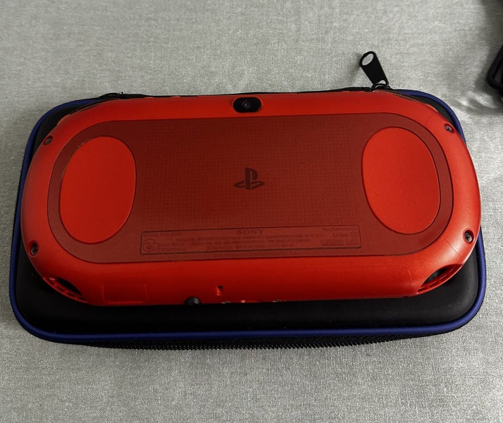 PS Vita PCH-2000 (Slim Model) – Red | 64GB | Fully Set Up62990728742401112