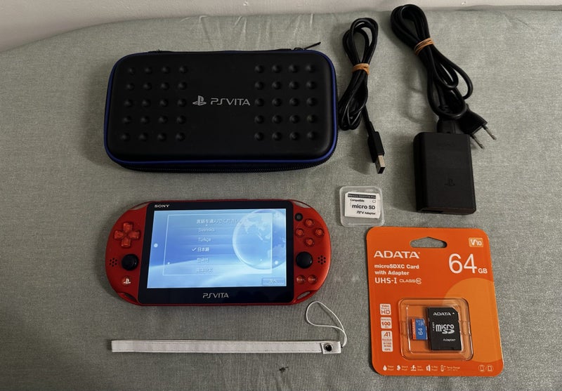 PS Vita PCH-2000 (Slim Model) – Red | 64GB | Fully Set Up629907287424011128