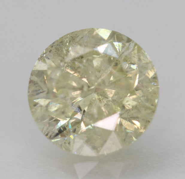 $1 RES * Valuation $7,830.00 * 1.25ct Round Large Yellow Diamond Loose IGL CERT Carousel 1