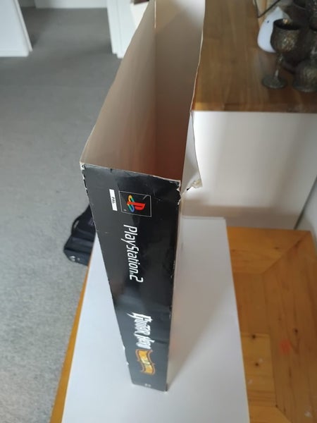 Playstation 2 with games + guitar hero in box with everything included. AllWorks62993530780417112