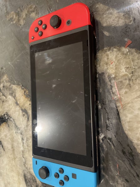Nintendo switch with charger and 100$ game Carousel 2