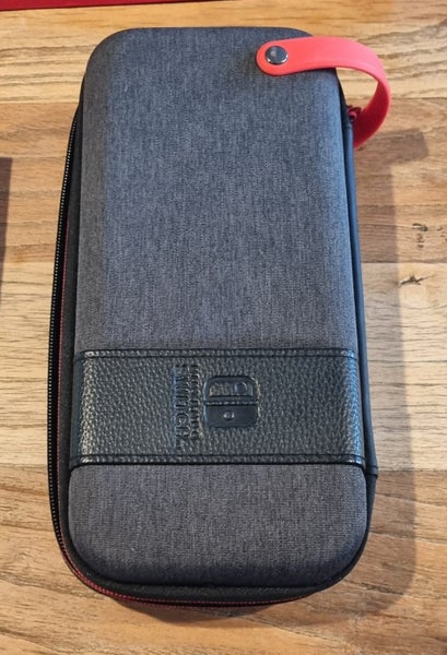 Nintendo Switch OLED - like new Carousel 9