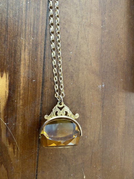 Gold Fob with chain Carousel 1