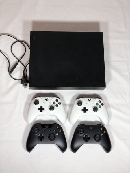 Xbox One X w/ Controllers Carousel 1