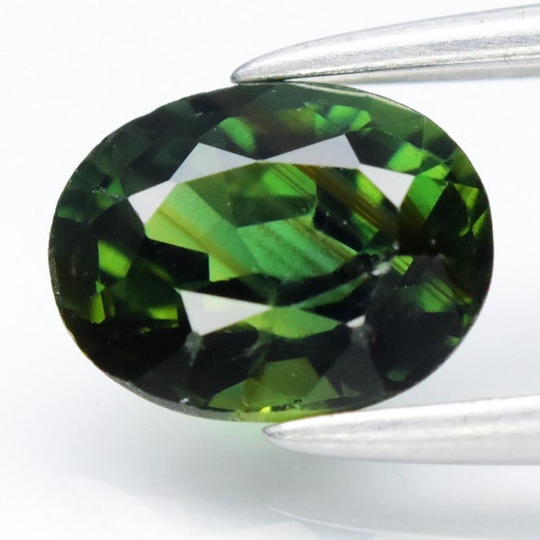 $1 RES * Buy Now $1450.00 * 0.87ct Unheated Oval Green Sapphire Loose Gemstone Carousel 1