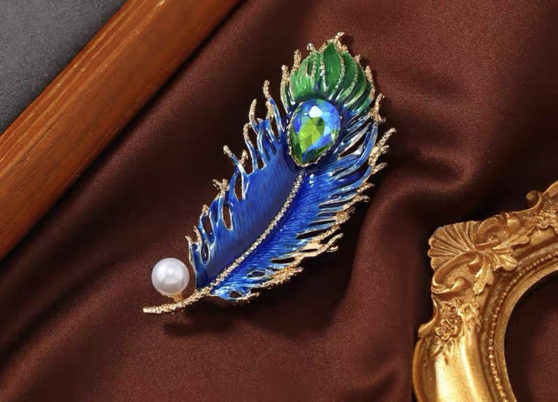 Elegant Peacock Feather Brooch with Pearl Accent Carousel 1