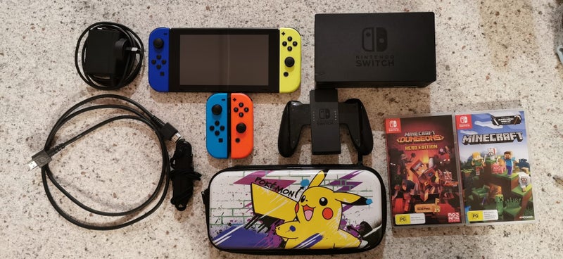 Nintendo Switch Bundle-2 Games, Case, Extra Joycons. Carousel 1