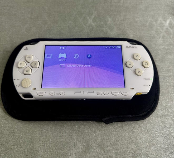 PlayStation Portable (PSP) 1000 – Ceramic White | 64GB | Fully Set Up Carousel 2