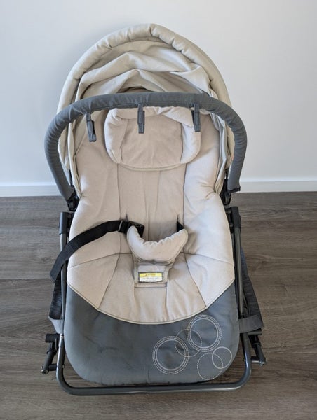 Baby Rocker Seat with Hanging Toy Bar and Sun Canopy Carousel 2