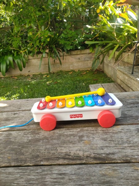 Fisher Price pull along musical xylophone toy on wheels Carousel 1