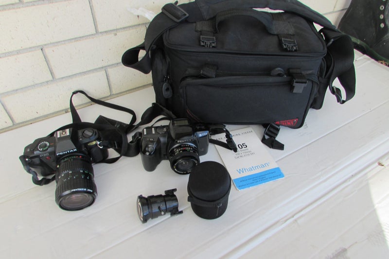 two Pentax Cameras and case Carousel 1