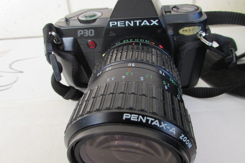 two Pentax Cameras and case Carousel 2