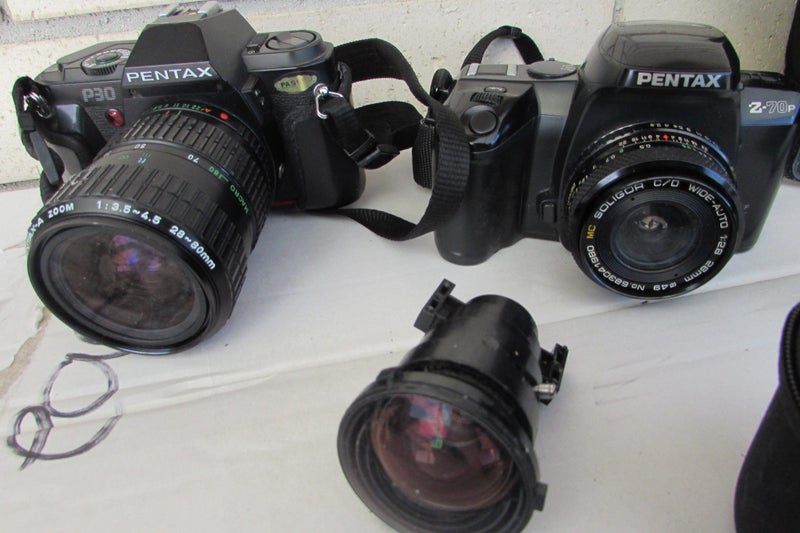 two Pentax Cameras and case Carousel 6