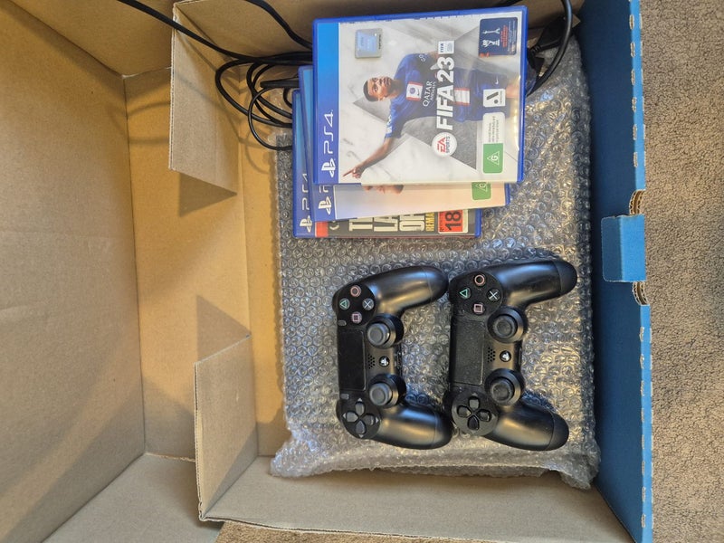 PS4 console and comtrollers Carousel 1