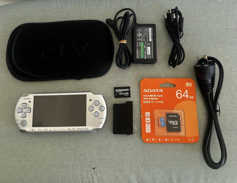 PlayStation Portable (PSP) 3000 – Mystic Silver | 64GB | Fully Set Up Carousel 1