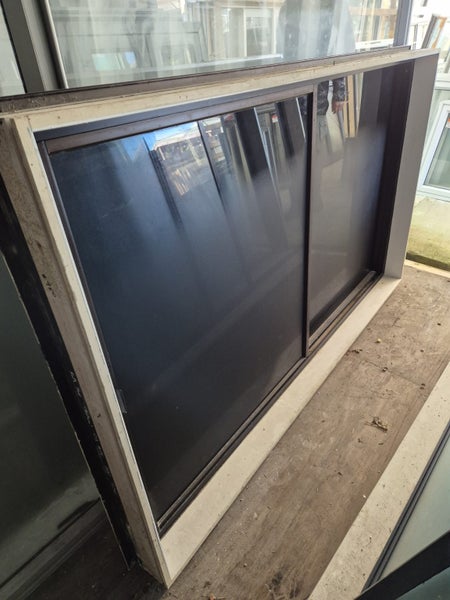 Bronze Sliding Window 1165 H x 2000 W # 2077 Carousel 1