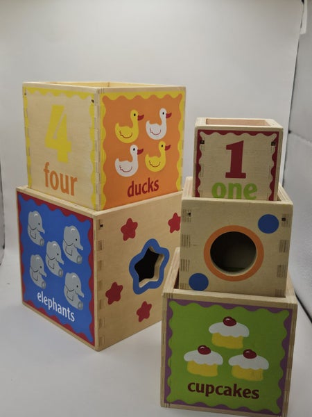 Educo / Hape Pyramid of Play – Wooden Nesting Blocks Carousel 1