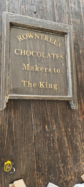 Old window with Roundtree Chocolate ad Carousel 1