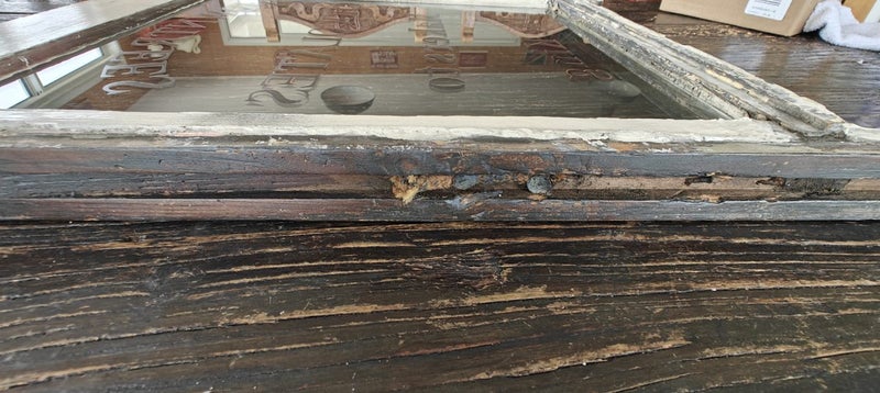 Old window with Roundtree Chocolate ad Carousel 10
