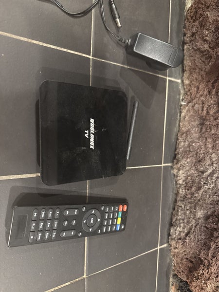 Worldmax TV with remote Carousel 1