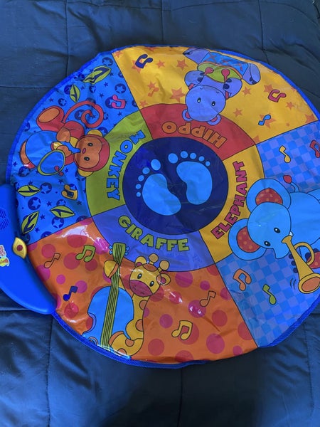Jolly Jumper with musical mat Carousel 6