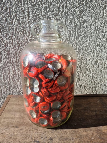 Lovely glass jar and bottle caps. Carousel 1