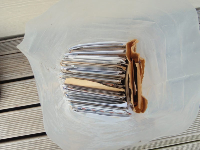 A Bag of used envelopes with slogan Postmarks Carousel 9