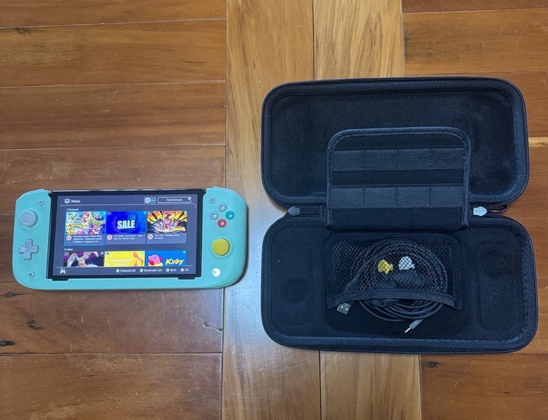Nintendo Switch OLED + Nitro Deck + 2 Games Carousel 2