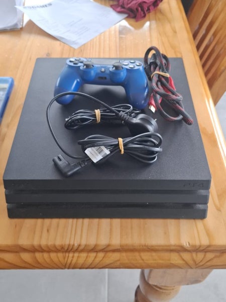 PS4 Pro, 2 Controllers & 5 games, EB warranty Carousel 1