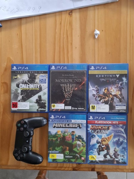 PS4 Pro, 2 Controllers & 5 games, EB warranty Carousel 2