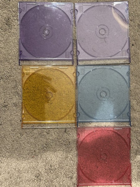 5 × colourful slim jewel cases — assorted colours, great condition Carousel 1