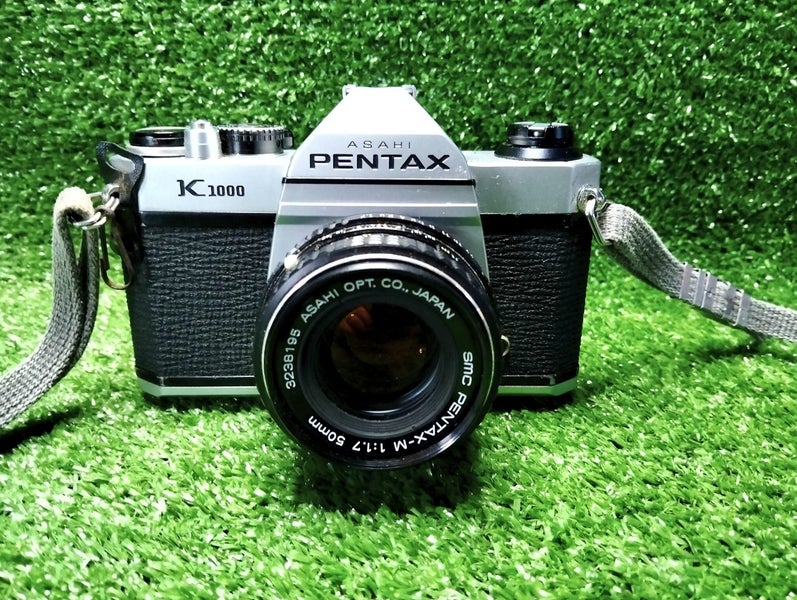 Pentax K1000 35mm film SLR camera & accessories Carousel 1