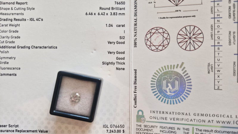 $1 RES * Valuation $12,041.00 * 1.04ct Round Large White Diamond Loose IGL CERT Carousel 1