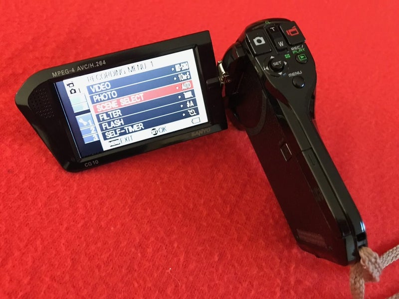 Sanyo video camera plus Olympus still camera Carousel 2