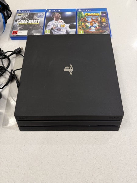PS4 Pro 1TB, 2x controllers, 3x games + headset Carousel 2